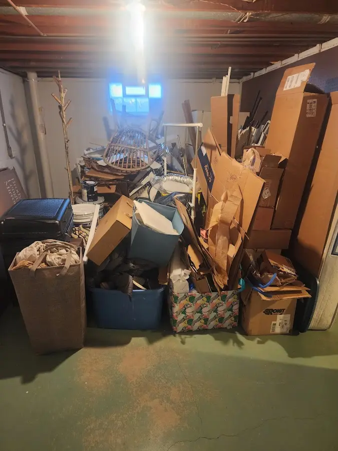 Roll-off dumpster container at job site for 2 Yard Dumpster Rental in Eunice